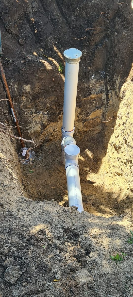 New sewer inspection riser installed in trench