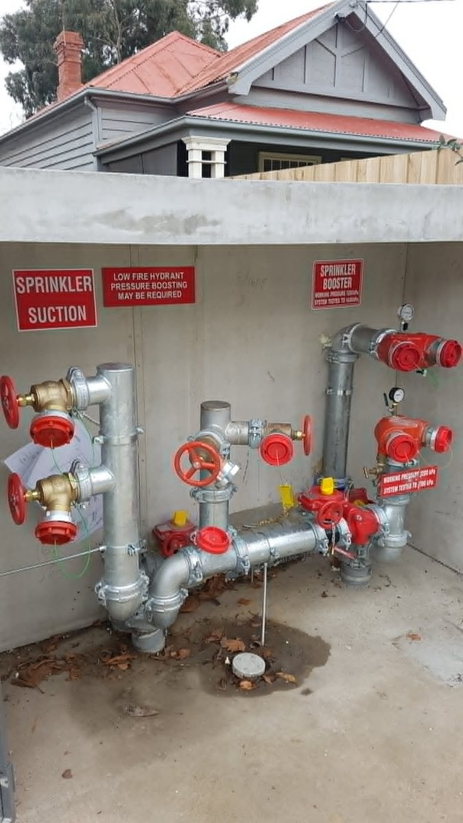 Commercial fire sprinkler and hydrant booster assembly